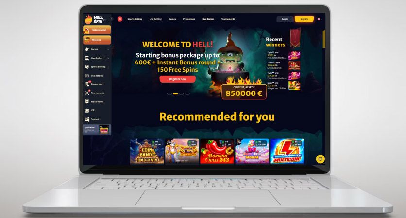 Началната страница на казино Hellspin на екрана на лаптоп